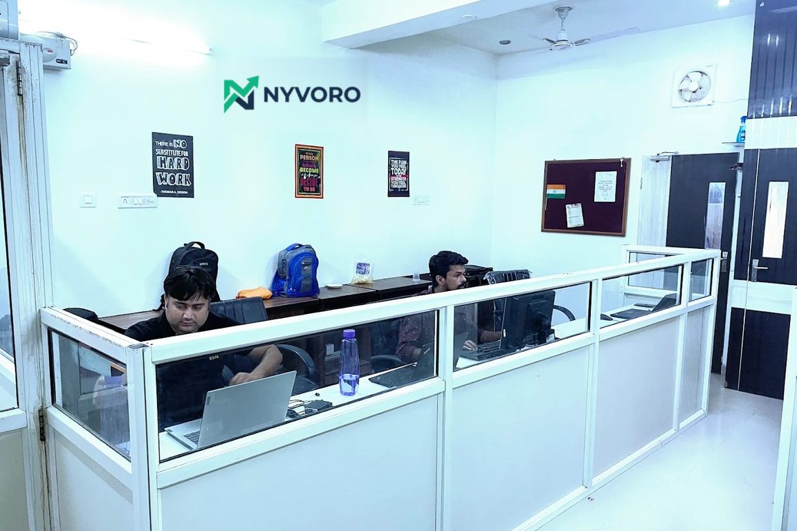 Nyvoro team members working at their desks